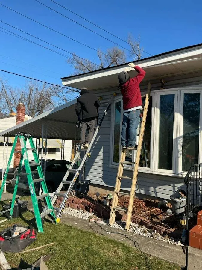 Restoration crew performing exterior repair in Monticello